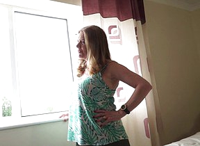 This horny big breasted British housewife has fun