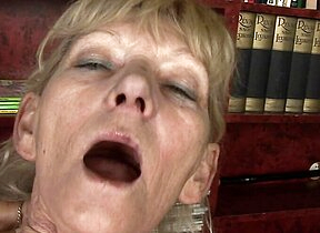 A horny German granny gets the brush hairy twat